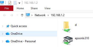 File Explorer terbuka di alamat jaringan 192.168.1.2 menampilkan folder dan printer yang dibagikan, keduanya bertanda panah hijau